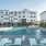 Pool in the daytime with fountains